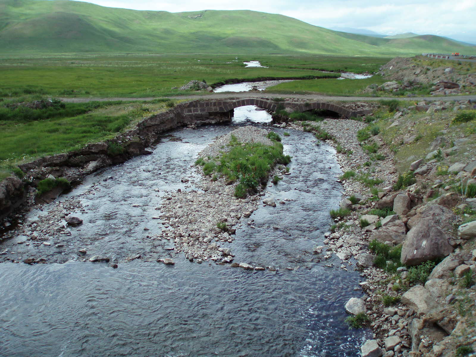 A car on an empty mountain road in Armenia