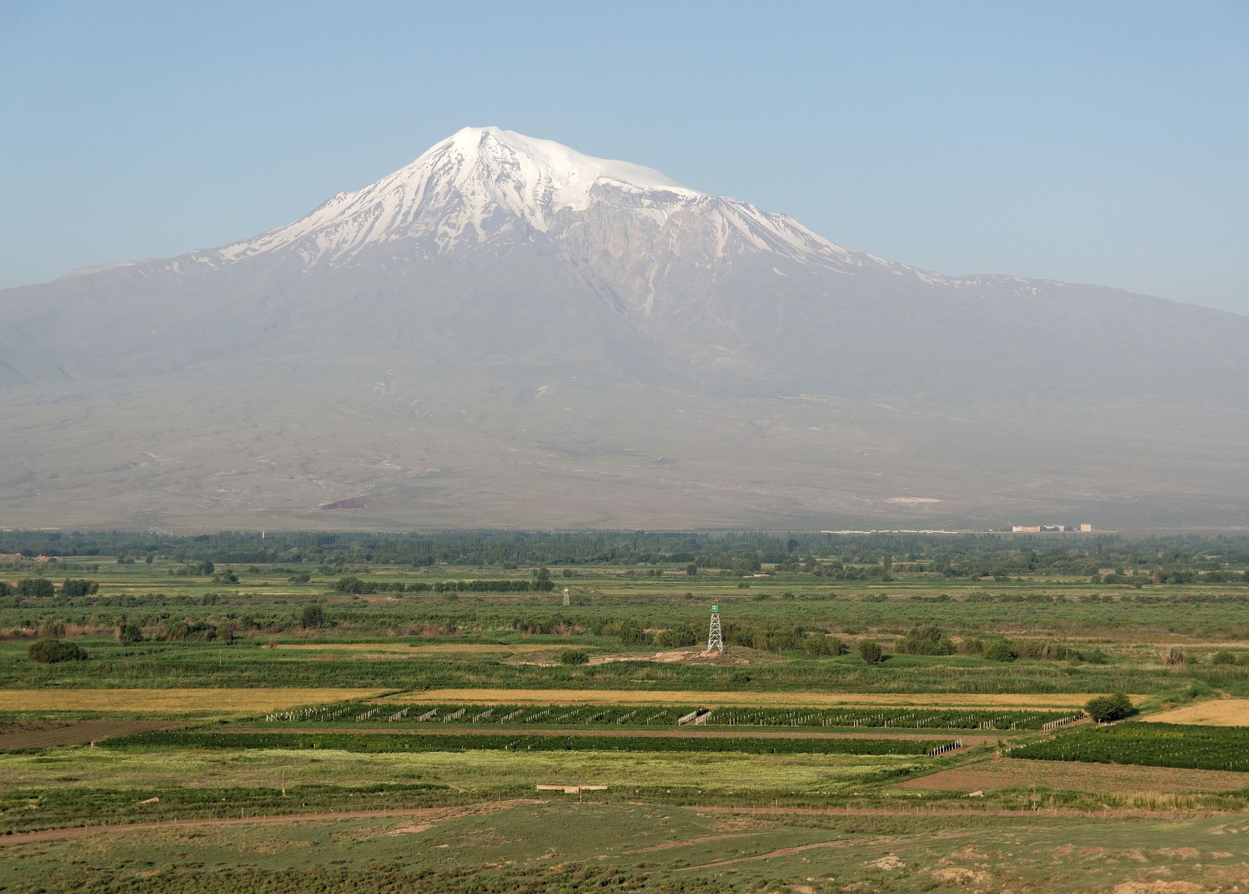 A road sign on an empty Armenian highway